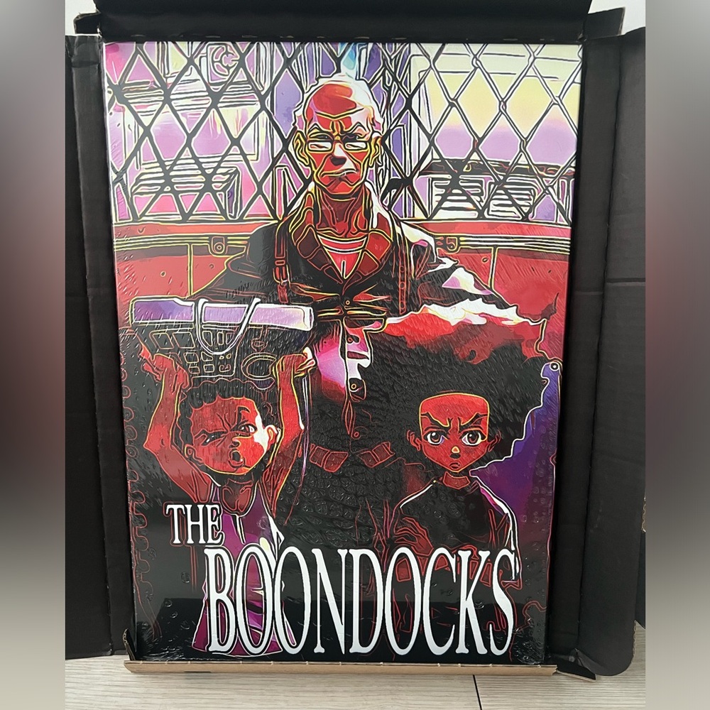 ‘THE BOONDOCKS’ stainless steel metal poster by a brand called Displate!